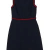 Navy cotton-blend dot print sleeveless sheath dress with contrast broderie edge motif