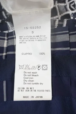 Navy cupro mixed-media bi-layer effect Glen check asymmetric knife-pleat midi A-line skirt