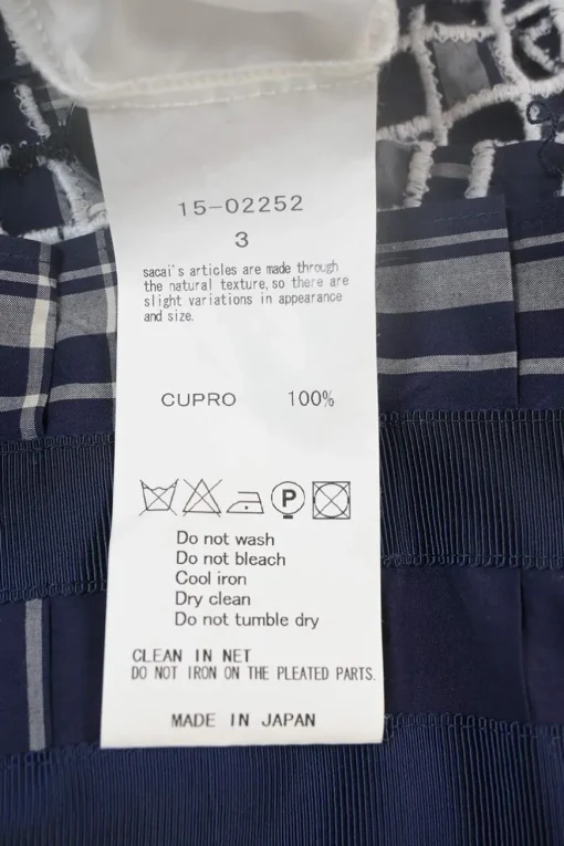 Navy cupro mixed-media bi-layer effect Glen check asymmetric knife-pleat midi A-line skirt