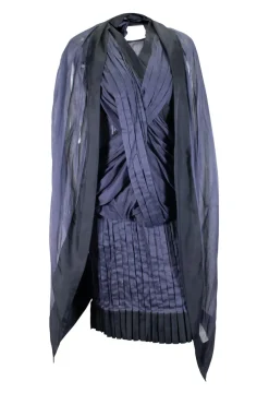 Navy pleated sleeveless knee-length dress with exaggerated tied bow at back
