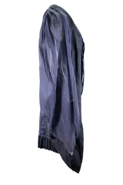 Navy pleated sleeveless knee-length dress with exaggerated tied bow at back