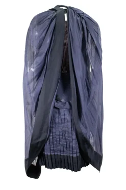 Navy pleated sleeveless knee-length dress with exaggerated tied bow at back