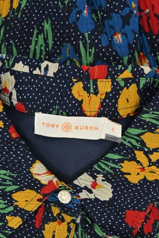Navy polyester floral print classic collar half-button pullover shift dress with flounce cuffs