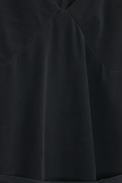 Navy sand-washed silk pullover lace-trimmed tie-waist racerback slip dress with adjustable spaghetti straps