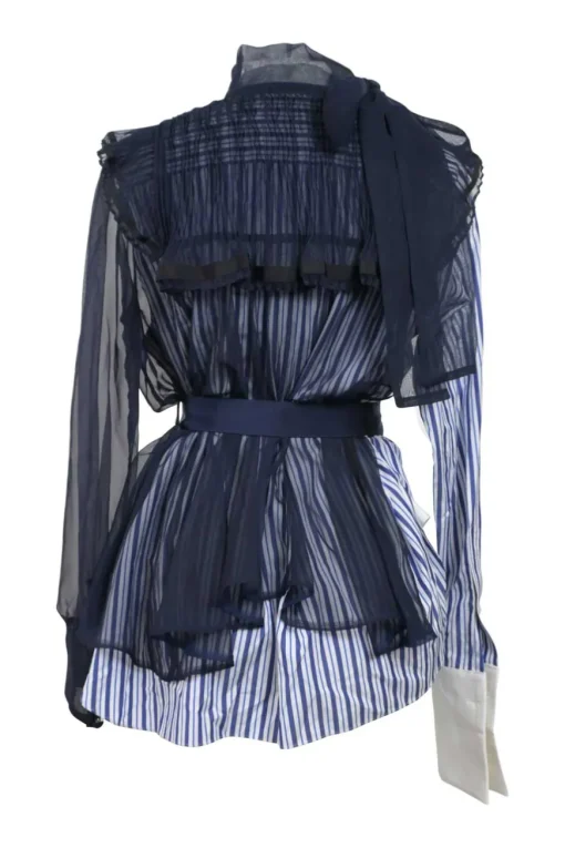 Navy semi-sheer polyester mixed-media peek-a-boo pussy-bow peplum blouse with pinutck ruffle bib
