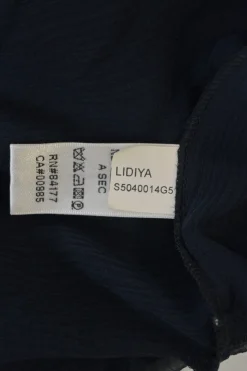 Navy semi-sheer silk Lidiya flutter sleeve peplum blouse with button-loop fastening at centre front
