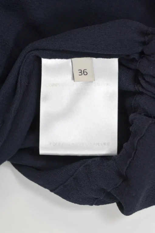 Navy semi-sheer tie-front keyhole peplum blouse with drawstring waist