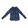 Navy silk kaleidoscopic abstract print pussy-bow blouse with flounce cuffs