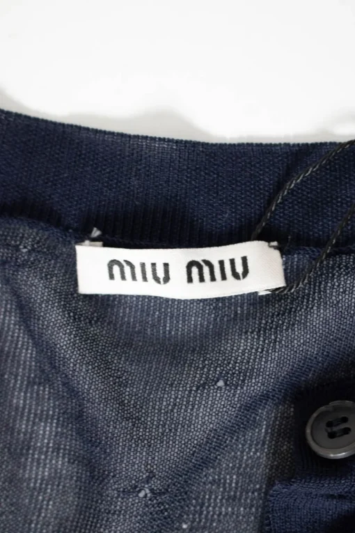 Navy slim fit knitted cardigan with ruffles and perforated pattern