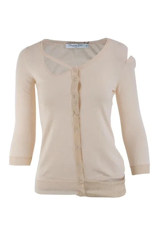 Off white cashmere and silk cold shoulder sweater with snap buttons.