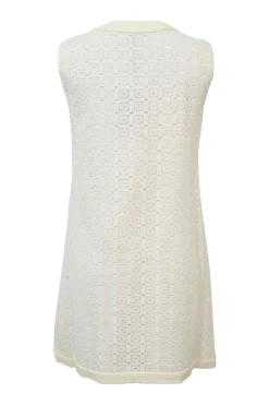 Off-White cotton eyelet crochet crew neck sleeveless pull-over shift mini dress embellished with oversized rhinestone buttons on front placket