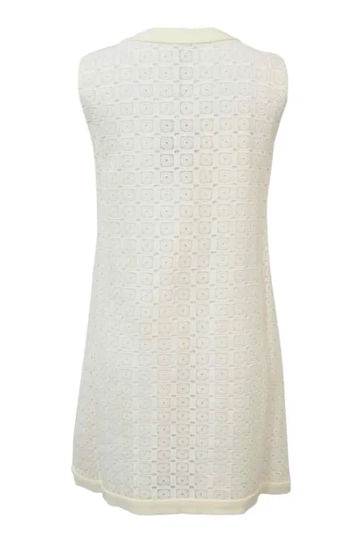 Off-White cotton eyelet crochet crew neck sleeveless pull-over shift mini dress embellished with oversized rhinestone buttons on front placket
