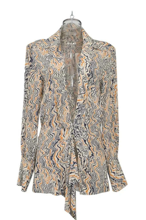 Orange abstract swirl print plunge neck tie-front logo tunic with dagger collar and bishop sleeves