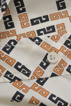 Orange and brown silk geometric print pussy-bow blouse