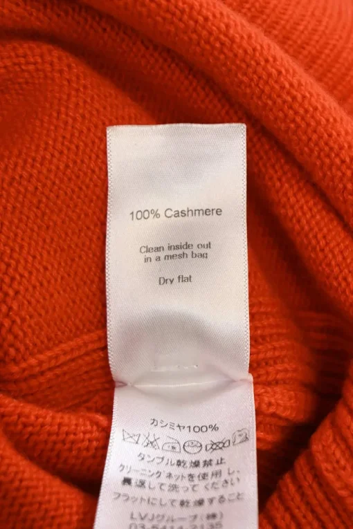 Orange cashmere knit crewneck pullover slit sweater
