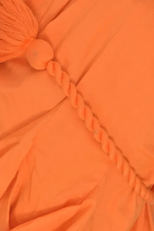 Orange cotton Casey tasseled mini A-line ruffle dress with twisted tie-waist fastening