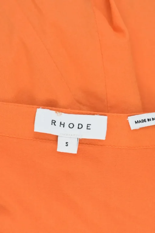 Orange cotton Casey tasseled mini A-line ruffle dress with twisted tie-waist fastening