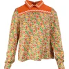 Orange long sleeve, silk and cotton top with polo collar and green geometrical pattern