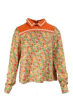 Orange long sleeve, silk and cotton top with polo collar and green geometrical pattern