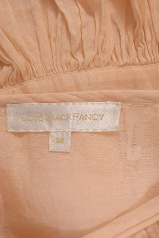 Pastel orange cotton-silk blend tier-ruffle flutter sleeve blouson mini dress with pintuck bib insert and gathered waistband