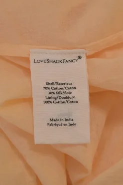 Pastel orange cotton-silk blend tier-ruffle flutter sleeve blouson mini dress with pintuck bib insert and gathered waistband