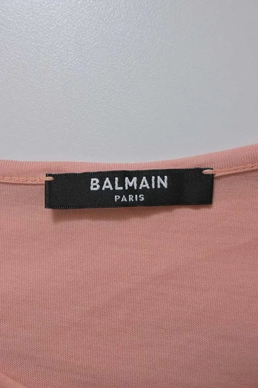 Peach screen-printed cotton jersey knit sleeveless flocked logo top with gold-finish metallic shank button shoulder line appliqué