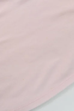 Pink bow-embellished jersey knit tank top featuring house code charm appliqué