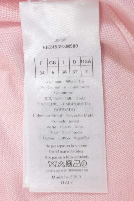 Pink embellished wool-blend short sleeve knit top featuring fixed floral paillette appliqué