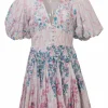 Pink floral print eyelet cotton balloon sleeve plunge neck mini dress with button-loop empire waist and godet skirt inserts