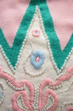 Pink knitted cashmere cardigan with embroidered embellishments