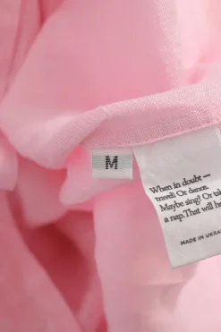 Pink linen smocked flounce sleeve Atlanta midi dress