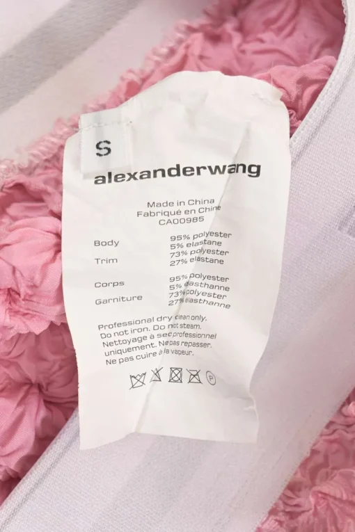 Pink polyester-blend shibori popcorn plissé midi pencil skirt with contrasting logo waistband