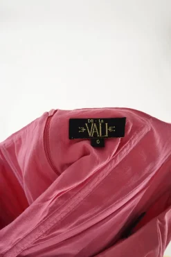 Pink recycled polyester-blend puff sleeve corset-style zip-up bustier top with ruffle edge trim