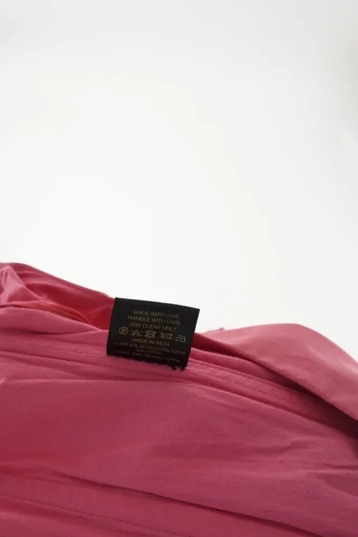 Pink recycled polyester-blend puff sleeve corset-style zip-up bustier top with ruffle edge trim