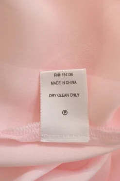 Pink semi-sheer polyester chiffon point-collar button-front maxi shirt dress with tonal slip insert