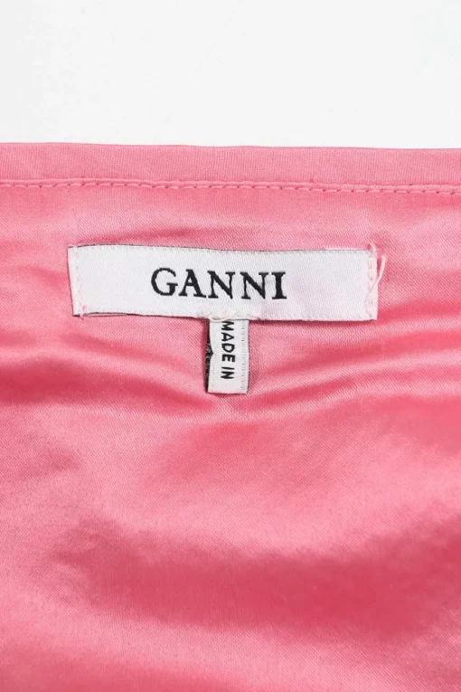 Pink sequin-embellished polyester racerback peplum camisole