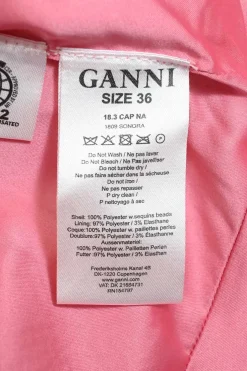 Pink sequin-embellished polyester racerback peplum camisole