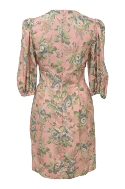 Pink silk floral print Tempest plunge neck mini dress with balloon sleeves and corset-style lace-up waistband