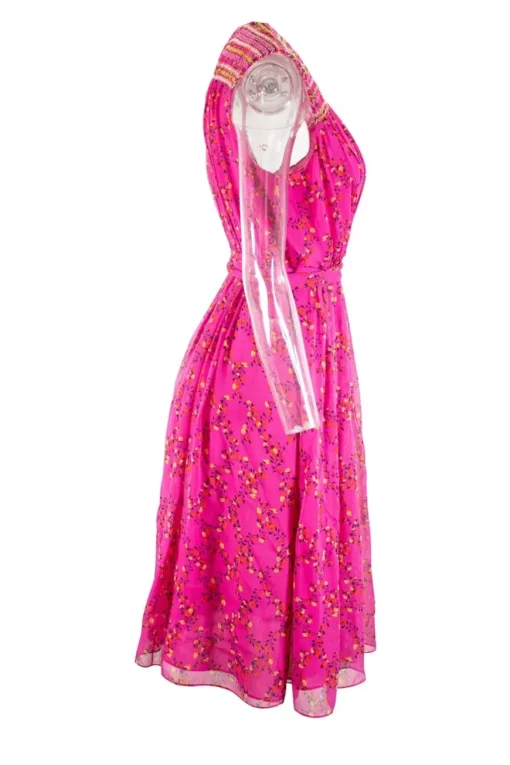 Pink sleeveless wrap mini dress with yellow red floral patterns