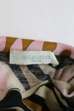 Pink wool funnel collar long sleeve knit top featuring abstract graphic intarsia motif