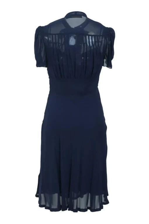 Polo navy silk tie-neck half-button empire-waist peek-a-boo puff sleeve mini dress with pintuck bodice