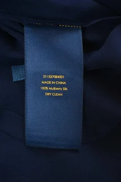 Polo navy silk tie-neck half-button empire-waist peek-a-boo puff sleeve mini dress with pintuck bodice