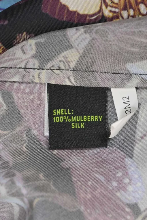 Purple bias-cut silk butterfly digi-print dolman sleeve blouse with keyhole back