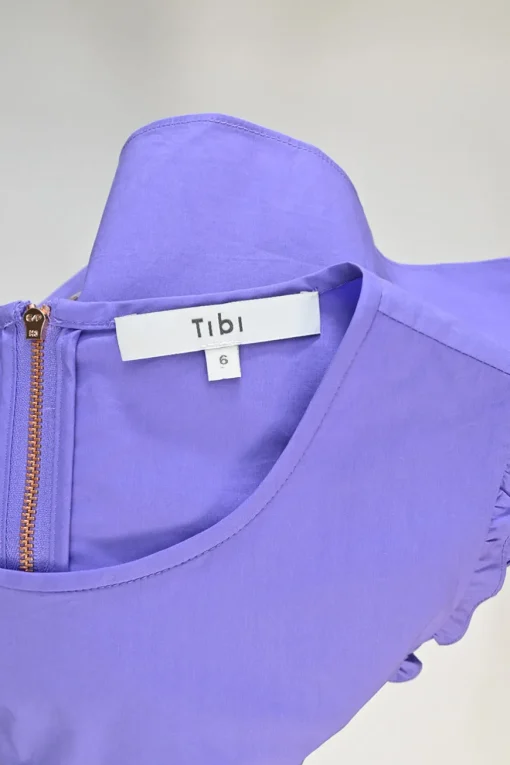 Purple cotton poplin cold-shoulder ruffle top with elasticated sleeve cuffs
