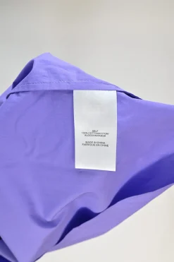 Purple cotton poplin cold-shoulder ruffle top with elasticated sleeve cuffs