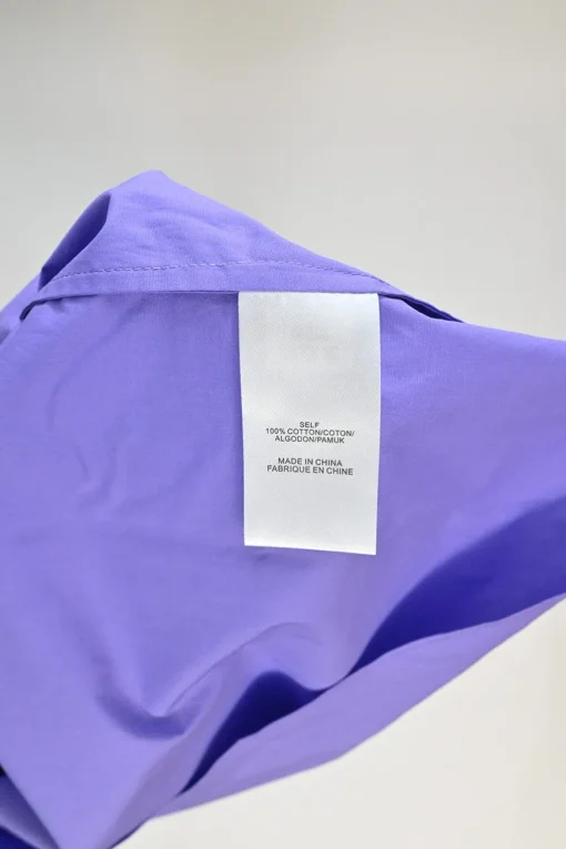 Purple cotton poplin cold-shoulder ruffle top with elasticated sleeve cuffs