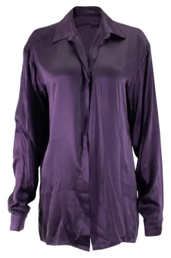 Purple long-sleeved top gathered on one side