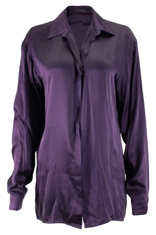 Purple long-sleeved top gathered on one side