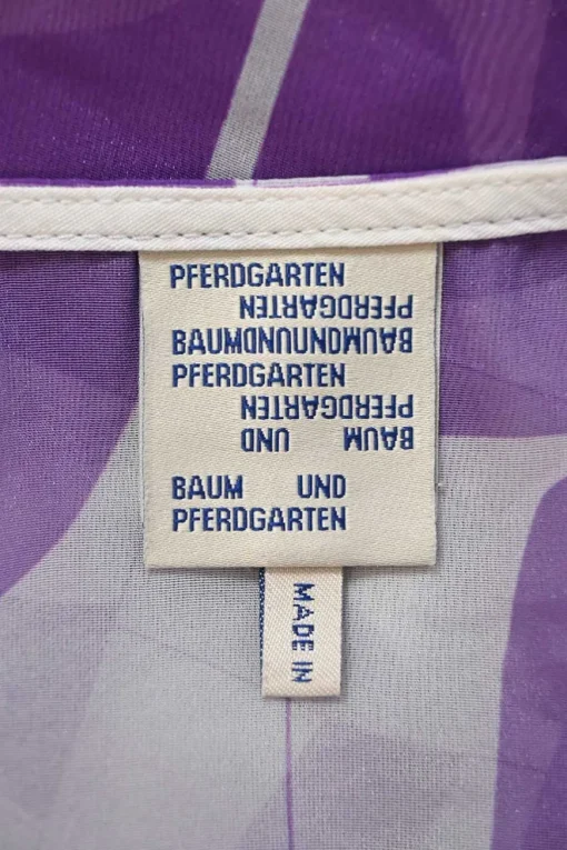 Purple semi-sheer polyester abstract graphic print pullover short sleeve blouse with chest patch pocket
