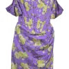 Purple silk-blend floral print off-shoulder mini dress with corset bodice and and sarong-style ruched skirt. Worn by Emily, in Emily in Paris.